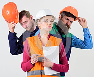 Woman, leader in hard hat with confident face stand