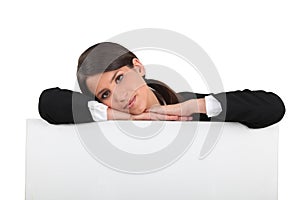 Woman leaning on a board photo