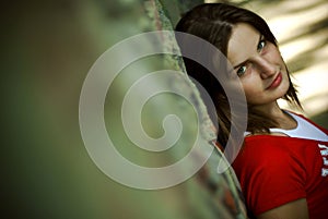 Woman leaning on wall