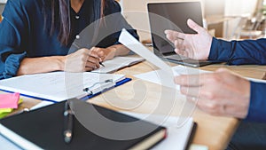 Woman learn and teach tutor concept education helping each other sitting in a table at class room