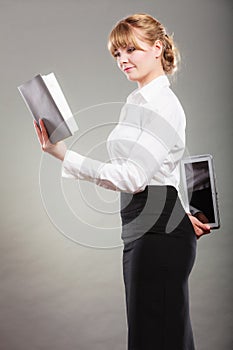 Woman learning with ebook and book. Education.