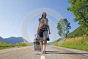 Woman leaving on a journey photo