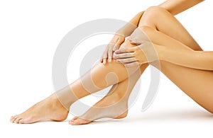 Woman Leg Skin, Body Massage and Legs Skin Care, white isolated photo