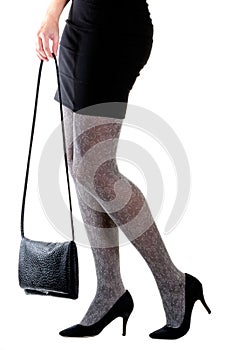 Woman legs with bag