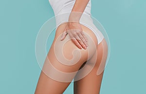 Woman legs with clean skin. Female buttocks ass without cellulite. Skin treatment. Anticellulite body massage for leg photo