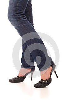 Woman legs dressed in jeans