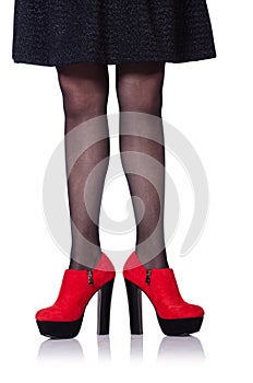 Woman legs with red shoes isolated