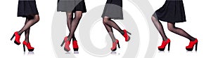 The woman legs with red shoes isolated on the white