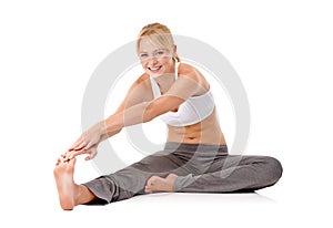 Woman, legs and stretching as portrait for pilates flexibility or practice for workout warm up, wellness or white