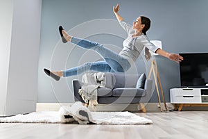 Woman Legs Stumbling With A Carpet