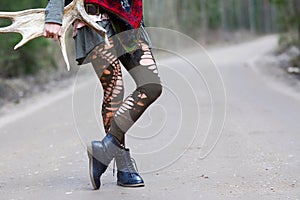 Woman legs in stylish and trendy leggings