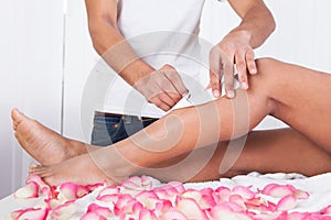Woman legs waxed photo