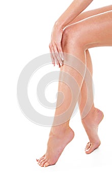 Woman legs on white background, isolated