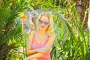 Woman with lemur photo