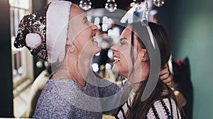 Woman, lesbian and laughing at Christmas party for festive celebration or funny joke, connection or gathering. Female