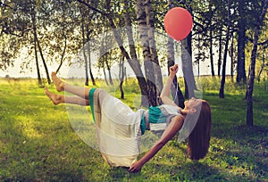 Woman levitating in the forest