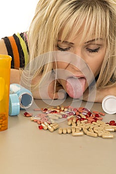 Woman lick lots of pills