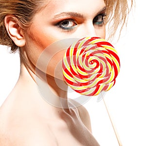 Woman licks candy