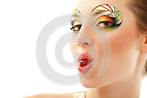 Woman licks candy with beautiful make-up isolated