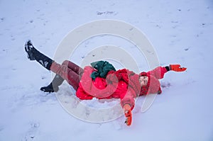 Woman lie down in snowfield photo