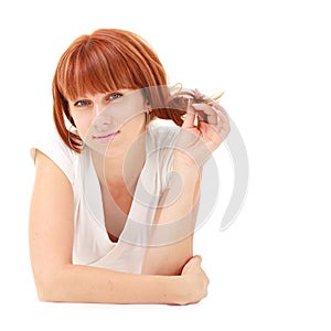 Woman lies on a white background with copyspace