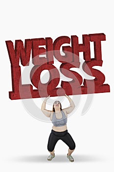 Woman lifting weight loss word