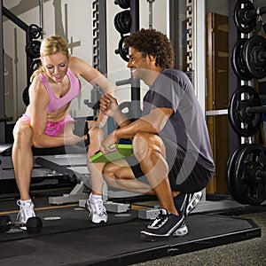 Woman lifting weights.