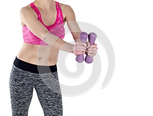 Woman lifting weights while doing aerobics.