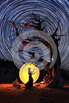 Woman Light Painted in the Eastern Sierras Under the Night Sky