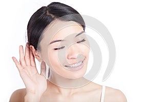 Woman listen by ear photo