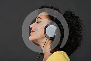 Woman listening music with closed eyes