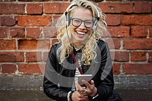 Woman listening music on her headphones