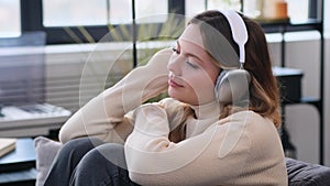 Woman Listening Music At Home