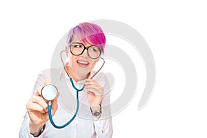 Woman listening pointing stethoscope at you camera