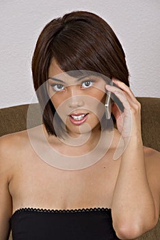 Woman listening to cell phone