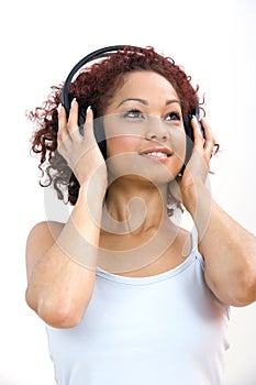 Woman listening to headphones