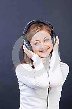 Woman listening to music in headphones