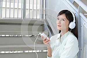 Woman listening to music