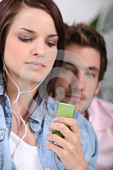 Woman listening to music photo