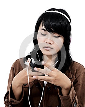 Woman listening to sad music with the phone