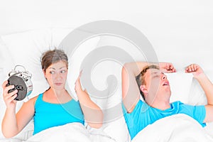 Woman listening to the snoring husband