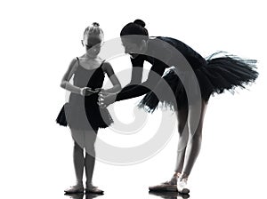 Woman and little girl ballerina ballet dancer