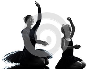 Woman and little girl ballerina ballet dancer dancing silhouett