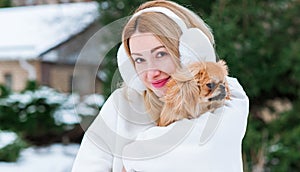 Woman with a little golden dog outdoor portrait
