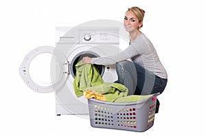Woman Loading Washing Machine