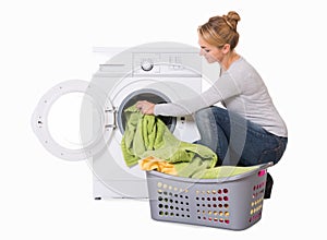 Woman Loading Washing Machine