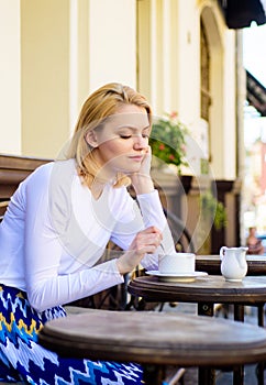 Woman lonely wait date. Dating advice for women. Still waiting him. How enjoy being single tips. Woman sits alone cafe