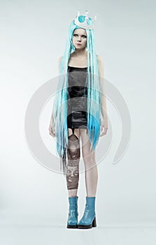 Woman with long cyan hair