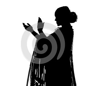 Woman in long dress stay in dancing pose. flamenco dancer, spanish. beautiful female profile black silhouette Isolated on white