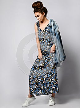 Woman in Long Floral Dress in Fashion Store - Portrait of girl in a clothes shop in a maxi summer dress